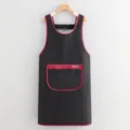 Delantal negro impermeable con borde rojo y bolsillo con cremallera para cocina trabajo. - Negro Con Borde