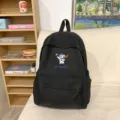 Casual black canvas backpack with cute cartoon dog embroidery, large capacity for daily use. - S / Black