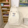 Minimalist solid color canvas backpack for women, large capacity school bookbag style. - S / White