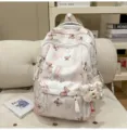 Süßer Schulrucksack mit Schmetterling Print und Plüsch Bär Anhänger im japanischen Stil für Mädchen. - Mit Anhänger / Rosa