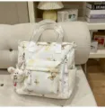 Japanischer Studenten Rucksack mit Schmetterling Muster und süßem Plüschhasen Anhänger. - Nachhilfe Tasche (Mit Anhänger) / Gelb