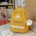 Yellow corduroy student backpack with cute floral pattern, lace pocket and puppy pendant. - Large with Pendant / Yellow