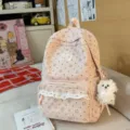 Pink floral corduroy school backpack variant with cute puppy pendant and lace trim. - Large with Pendant / Pink