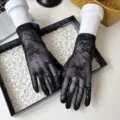 Elegant black lace sunscreen gloves for women, summer thin breathable mesh floral short five-finger. - One Size / Black