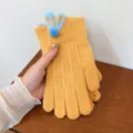 Women winter warm knitted gloves with blue plush bunny ball and hollow design for cold weather. - One Size / Yellow