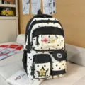 Sac a dos scolaire en toile a pois noir et blanc avec fenetre transparente pour etudiants - Étoile et Os / Noir