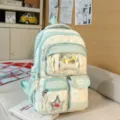 Sac à dos ita à pois vert menthe, joli cartable esthétique avec poche avant transparente. - Étoile et Os / Vert