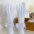 White lace gloves feature delicate satin bows and polka dot mesh cuffs, ideal for weddings. - One Size / Polka Dot Lace Bow / White