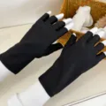Black half-finger sun protection gloves detail shot, breathable spandex fabric, spring summer wear. - Half Finger / Black