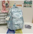Blue bamboo print student backpack, large capacity multi-pocket casual school book bag for daily use. - Hanging Charm Style / Blue