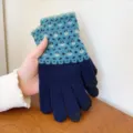 Detail view of women's knit winter touch screen gloves with cozy warm fleece lining. - One Size / Navy Blue