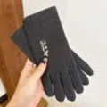 Dark grey thermal touch screen gloves detail view, showing delicate love embroidery and soft fabric. - One Size / Dark Gray