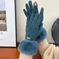 Detail view of winter warm women touchscreen gloves with plush fur cuffs in deep teal color. - One Size / Teal