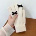Chic women knit gloves featuring cute black bow details, soft warm winter thermal handwear. - One Size / Off White