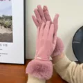 Close-up detail of winter warm touch-screen gloves in pink with soft faux fur cuffs cozy desk. - One Size / Pink