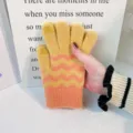 Women's knitted warm touchscreen gloves featuring stylish yellow and orange chevron pattern. - Orange-Yellow