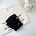 Men's winter warm knit convertible half-finger gloves in solid black with button flip top. - One Size / Black