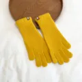 Close-up detail view of cozy yellow knit winter gloves, showing soft thermal fabric texture and cuff. - One Size / Yellow
