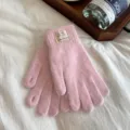 Close-up of winter fuzzy knit fingerless gloves in pink, warm thick touch design. - One Size / Pink