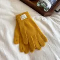 Women winter warm knitted fingerless gloves solid yellow color stylish fashion handwear detail view. - One Size / Yellow