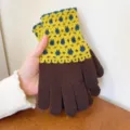 Detailed view of the warm knit texture and touch-sensitive fingertips of the winter gloves. - One Size / Coffee