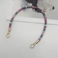 Detailed view of a 40cm colorful wrapped handbag strap replacement with gold metal clasps. - Silver Hook / Rose Pink Light Blue