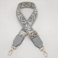 Tracolla di ricambio in jacquard con motivo a foglie grigie e finiture in ecopelle dorata. - Fondo Beige Grigio Medio Bianco con Pelle Grigia