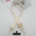 Correa ajustable para teléfono de lona beige con herrajes dorados y detalle de parche. - Gancho Dorado + Junta T / Blanco Roto