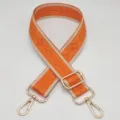 Correa de repuesto para bolso tejida en naranja con herrajes dorados y diseño étnico detallado. - Gancho Plateado / Naranja con borde beige