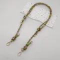 Detailed view of colorful woven bag strap with golden metal clasps and retro ethnic style. - Silver Hook / Fluorescent Green