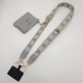 Universeller Umhänge Handy-Tragegurt mit kleiner Münztasche und verstellbarem Gurtband. - Goldhaken-Set / Grau
