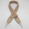Detailed view of wide retro ethnic embroidered bag strap, adjustable crossbody replacement strap. - Beige Apricot Brown + Apricot Leather