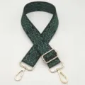 Dettaglio tracolla in tessuto jacquard, cinghia regolabile con fibbie in metallo dorato. - Verde Scuro Metallizzato