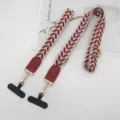 Detailed view of mobile phone lanyard strap with red leaf embroidery, gold threads and hardware. - Long + Short Style / Red
