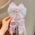 Fermaglio per capelli fiocco perle bambini vista dettagliata, accessorio organza fiabesco con nastri. - Molletta per Capelli Fiocco Rosa