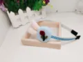 Kids fabric headband with blue embroidered flower and pink plush bunny ears variant. - Rabbit Headband Style / Blue