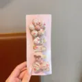 Vista dettagliata del set fermagli per capelli bambini, accessori stoffa fiore e fiocco. - Set di 5 Pezzi Fiore Floreale / Five-Piece Set