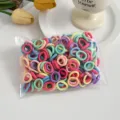 Colorful mini hair ties detail view, seamless elastic bands for kids hair styling accessories. - Colorful 100 Pcs