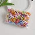 Elatici per capelli colorati per bambini, morbidi elastici in busta trasparente. - 100 Pezzi / Serie Candy