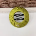Green satin hair bun maker detail, elegant hair styling clip accessory for women and girls. - Green