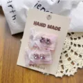 Bonita pinza de pelo con lazo de estrás rosa, accesorio encantador para el estilo diario. - Par Pinzas Cuadradas Lazo Rosa