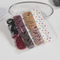 Detailed view of colorful seamless high-elastic hair ties set with display cards for styling. - Korean Style Colors