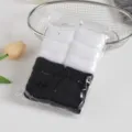 Nahtlose Frottee-Haargummis Nahaufnahme, Schwarz-Weiß-Packung im klaren Beutel. - Schwarz-Weiß-Serie