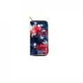 Close-up detail showing the metallic golden zipper pull and vibrant abstract star print texture. - QBDX03A