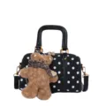 Stylish black polka dot shoulder bag with cute brown teddy bear plush pendant for women - With Charm Style / Black
