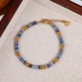 Blue natural stone beaded bracelet with gold metal spacers and stainless steel tag. - Style 2 (S-01) / Blue Gray