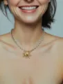 Elegante e Versatile Collana con Pendente Sole Bicolore in Acciaio Inossidabile Chic - Sole