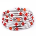 Multi-layer red bead wrap bracelet with silver rose metal charms and sleek metallic coils. - 6mm Red Agate