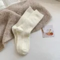 Women's warm winter wool mid-tube socks in solid off-white with cozy knitted ribbed texture. - C-Diamond Wool Socks / White