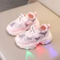 Close-up of pink children light-up sneakers with glitter details and convenient velcro straps. - S86 pink / Size 25 (Internal Length 15.5)